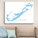 Map of Bermuda framed on a wall above a beige sofa with light blue pillows.