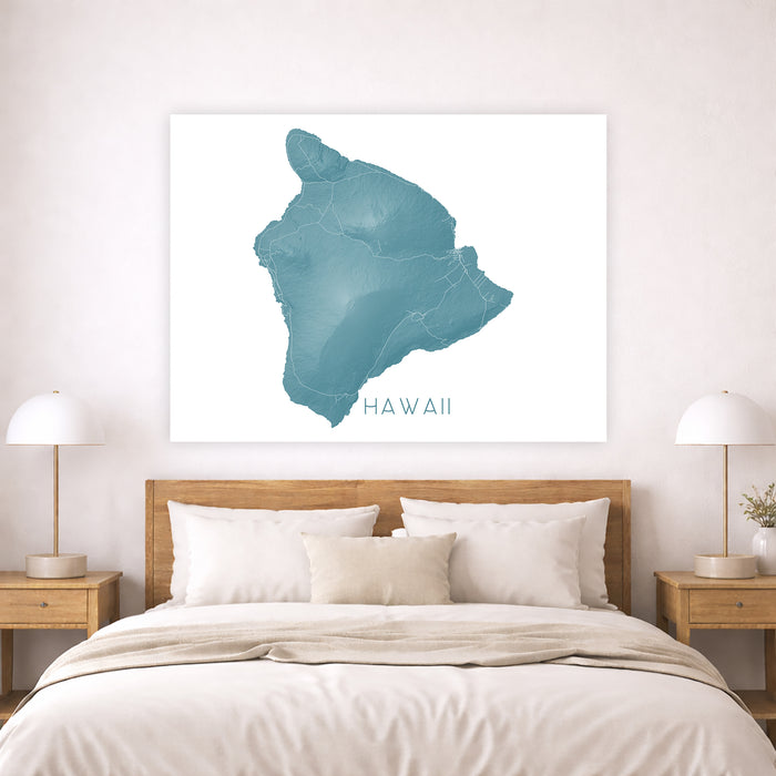 Framed map of Hawaii above a bed in a bedroom setting