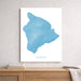 Map of Hawaii in blue on a white background, framed and leaning against a wall.