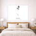 A minimalist black ink-style wall art print featuring a stylized calligraphic figure and the text 'BIMINI THE BARBARAS' on a white canvas, displayed above a neatly made bed in a modern bedroom setting.