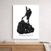 A vertical black-and-white map art print of Block Island, Rhode Island, displayed on a light gray wall above a wooden console table with books and a throw blanket.