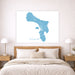 Map of Bonaire on a wall above a bed in a bedroom