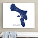 Framed map of Bonaire on a wall above a white surface.