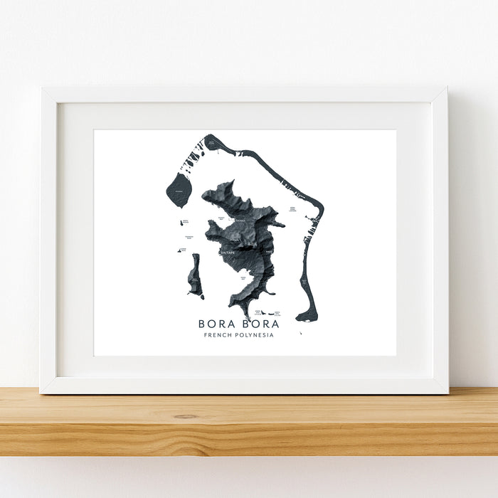 Framed map of Bora Bora on a white wall
