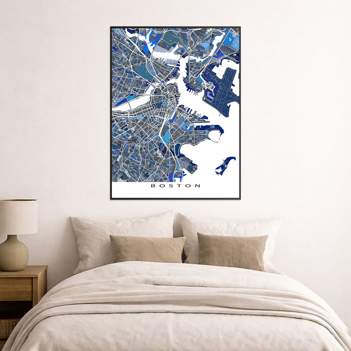 Framed map of Boston on a wall above a bed