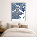 Framed map of Boston on a wall above a bed