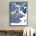 Framed map of Boston on a wall above a wooden bench.