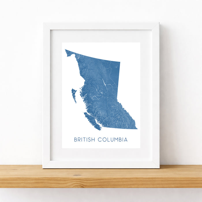 Framed map of British Columbia on a white wall