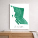 Map of British Columbia in green on a white background, displayed on a wall above a wooden shelf.