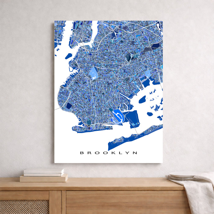 Map of Brooklyn on a white wall above a wooden surface