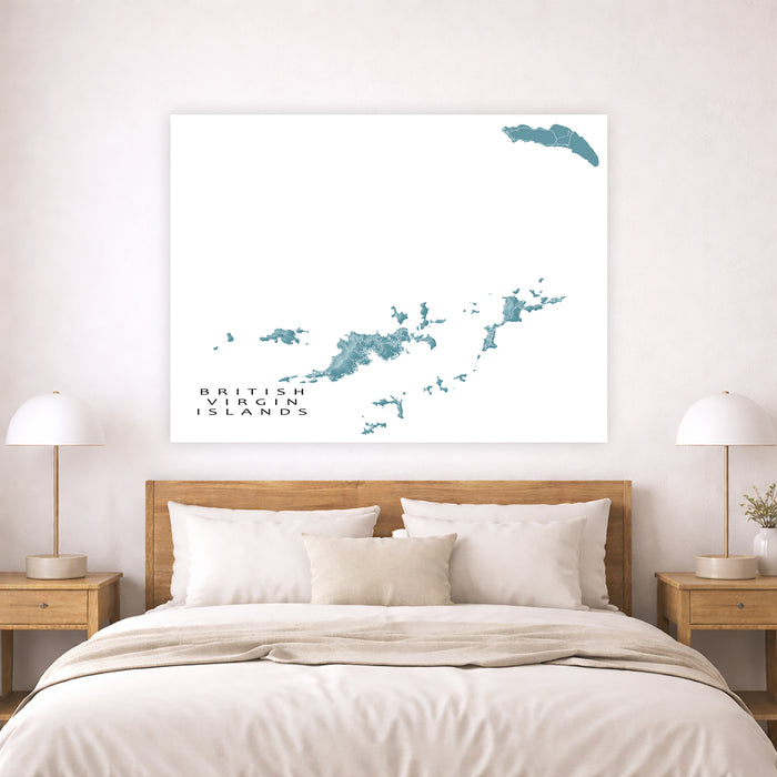 Map of British Virgin Islands on a wall above a bed in a bedroom.