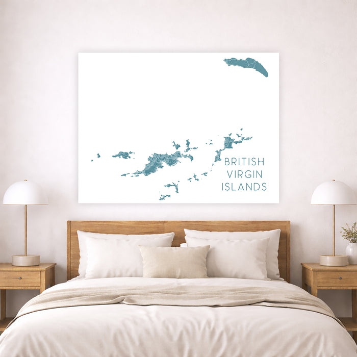 Map of British Virgin Islands on a wall above a bed in a bedroom.