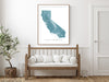 California map print with natural landscape and main roads designed by Maps As Art.