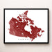 Framed map of Canada in red on a white background