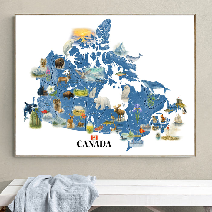 Framed map of Canada with various animals and landmarks on a wall.