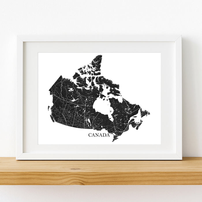 Framed map of Canada on a white wall
