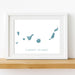 Framed map of the Canary Islands on a white wall