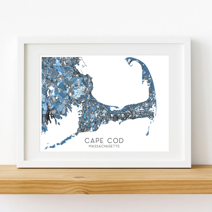 Framed map of Cape Cod, Massachusetts on a white wall.
