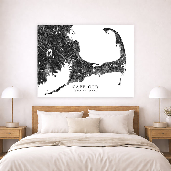 Map of Cape Cod Massachusetts on a wall above a bed