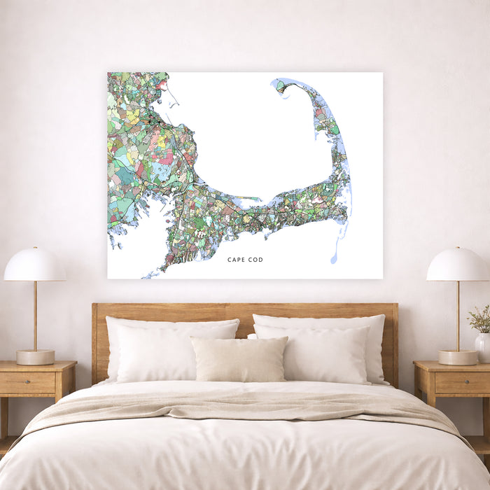 Bedroom with a map of Cape Cod on the wall above a bed.