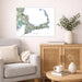 Living room with a gray sofa, wooden cabinet, and decorative items.