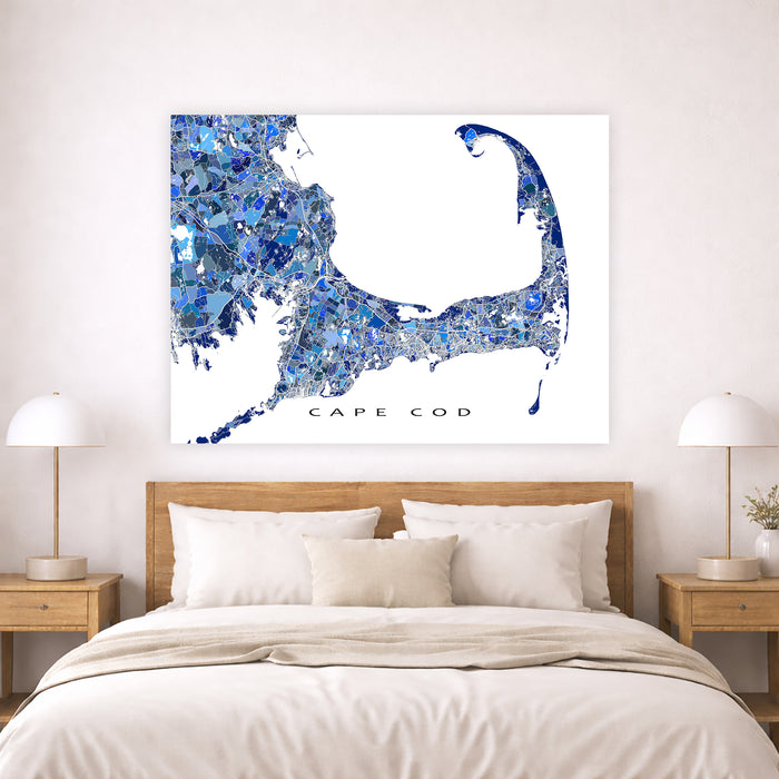 Cape Cod map artwork on a wall above a bed in a bedroom setting