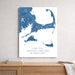Map of Cape Cod, Martha's Vineyard, and Nantucket on a white wall above a wooden surface.