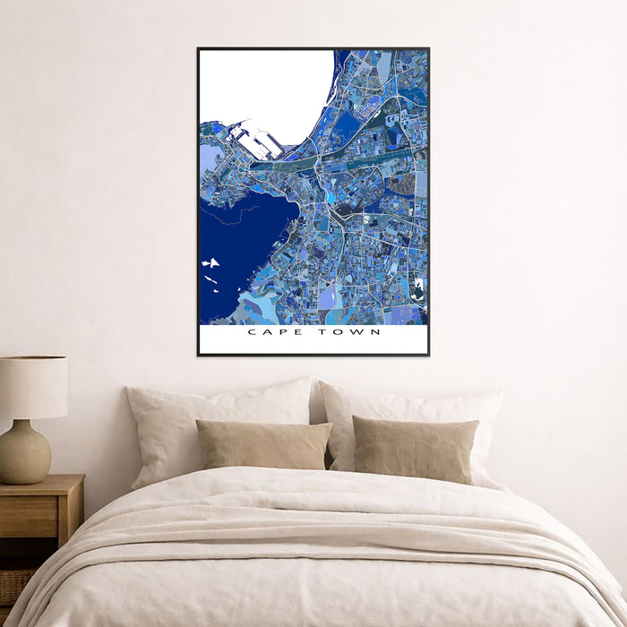 Framed map of Cape Town above a bed in a bedroom