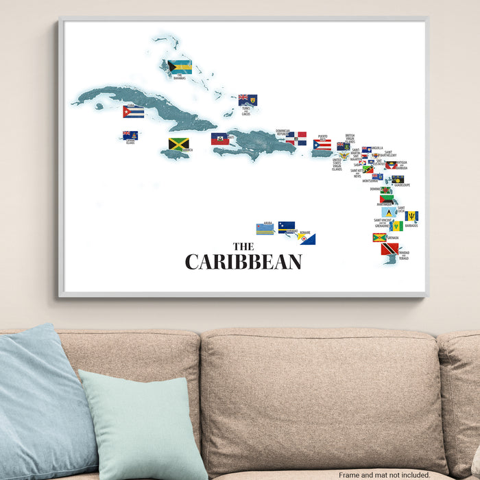 Map of the Caribbean with country flags on a wall above a sofa.