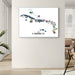 Framed map of the Caribbean with country flags on a wall in a room.