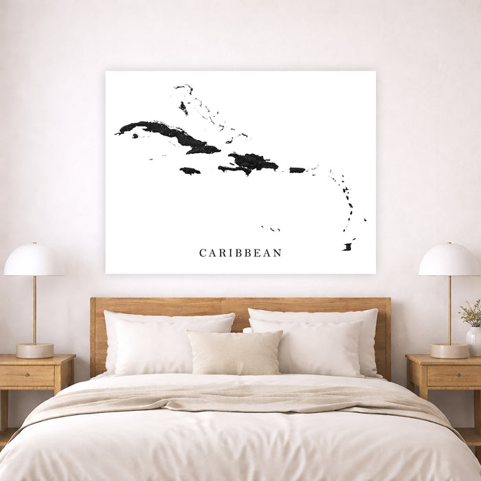 Map of the Caribbean on a wall above a bed in a bedroom setting