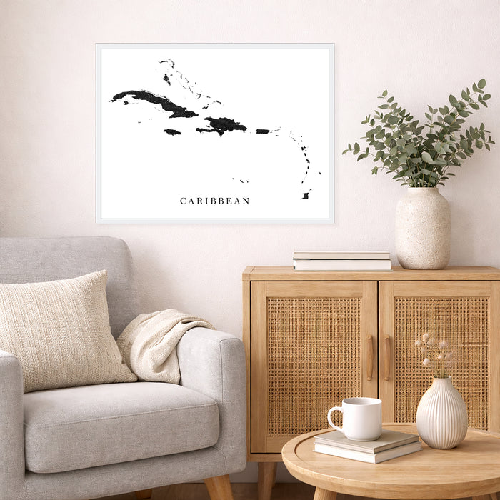 Living room with a map of the Caribbean, beige sofa, wooden cabinet, and decorative items.