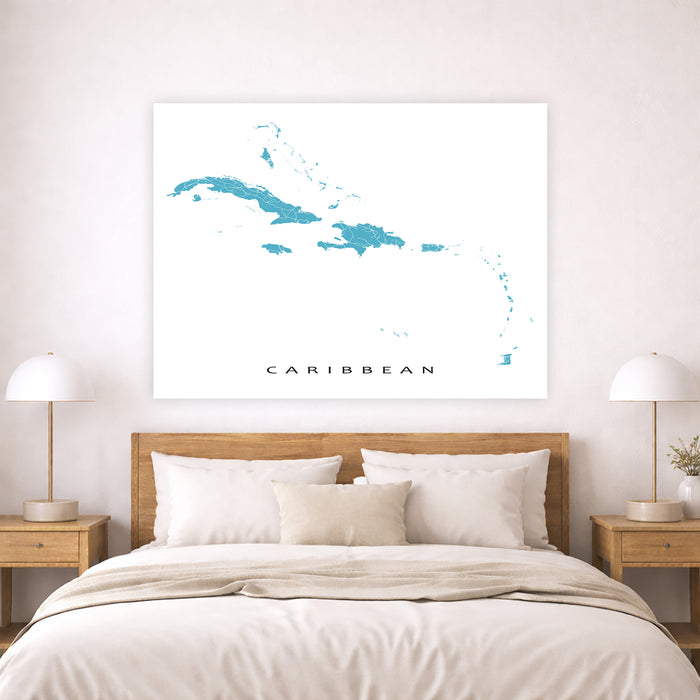 Map of the Caribbean on a wall above a bed with wooden headboard and nightstands.