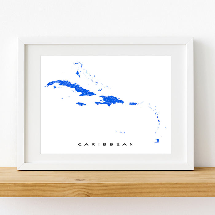 Framed map of the Caribbean on a white wall