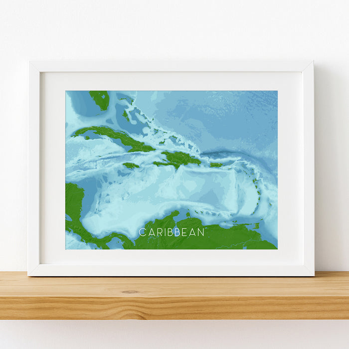 Framed map of the Caribbean on a white wall