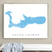 Framed map of Grand Cayman on a wall above a bench.
