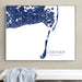 Framed map of Chatham, Massachusetts on a wall above a white bench.