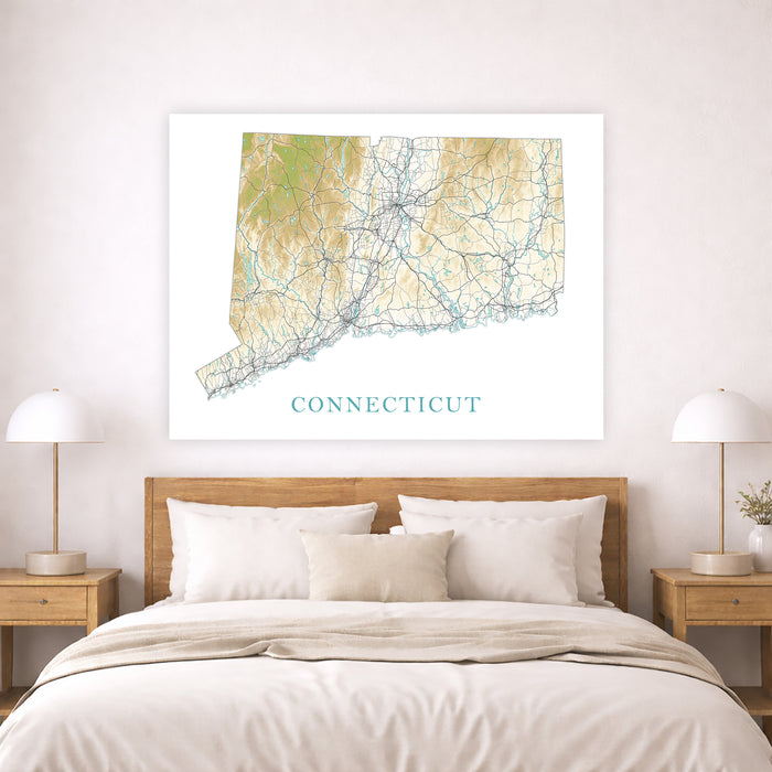 Framed map of Connecticut above a bed in a bedroom setting