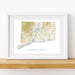 Framed map of Connecticut on a white wall