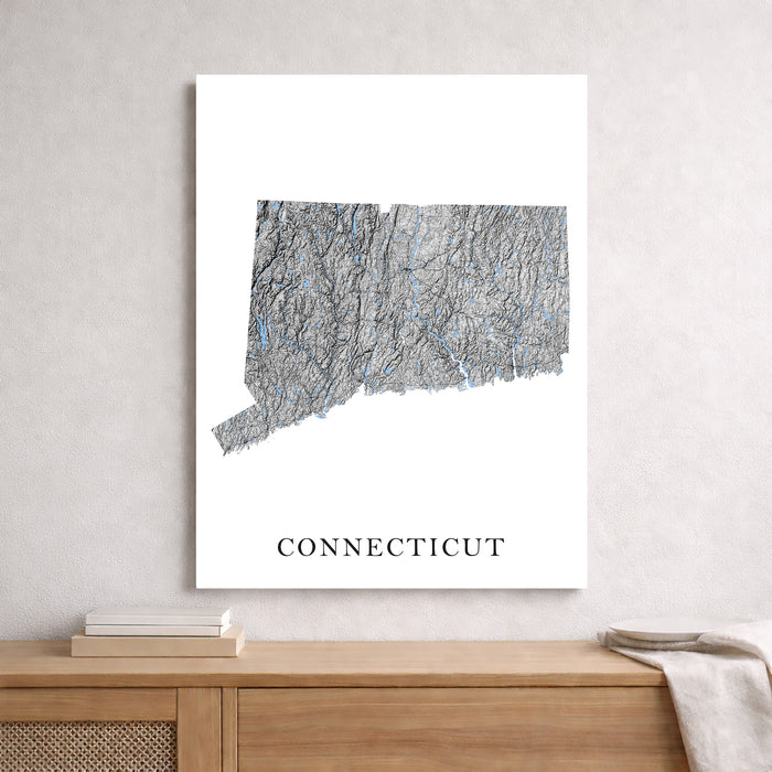 Map of Connecticut on a white background above a wooden surface