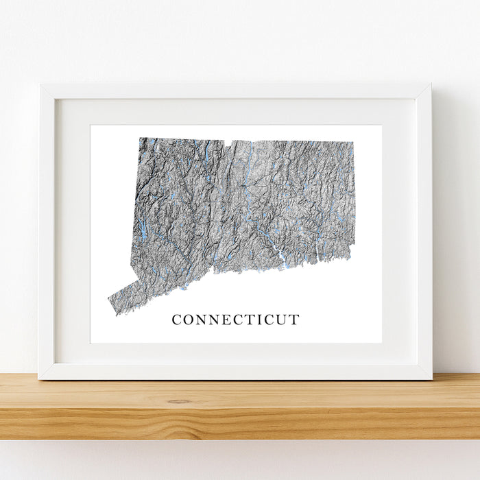 Framed map of Connecticut on a white wall