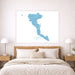 Map of Corfu on a wall above a bed in a bedroom