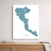 Map of Corfu, Greece on a white background above a wooden surface.