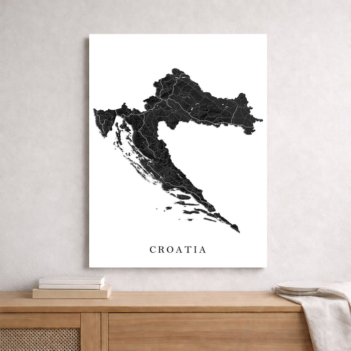 Map of Croatia on a white background above a wooden surface.