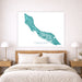 Map of Curacao on a wall above a bed in a bedroom