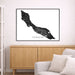 Framed map of Curaçao on a wall above a wooden cabinet and sofa.