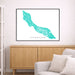 Framed map of Curacao on a wall above a wooden cabinet and sofa.