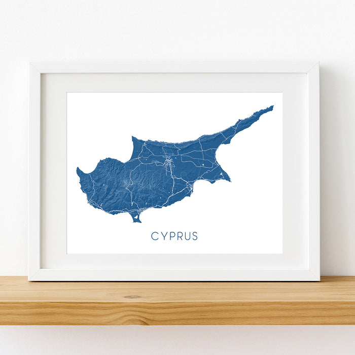 Framed map of Cyprus on a white wall
