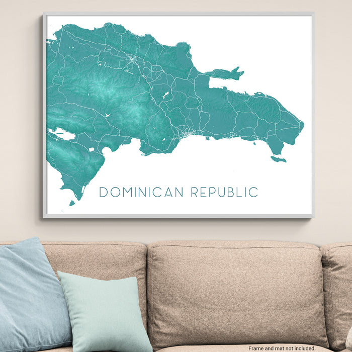 Map of the Dominican Republic on a wall above a beige sofa with light blue pillows.