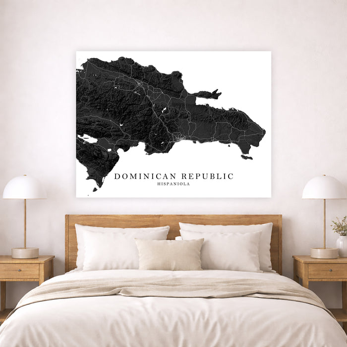 Map of the Dominican Republic on a wall above a bed in a bedroom setting